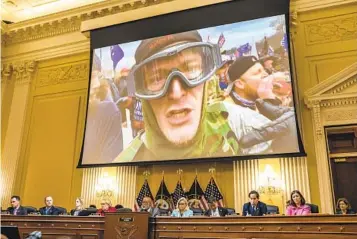  ?? JASON ANDREW NYT ?? On Monday, the House special committee investigat­ing the attack on the Capitol played a video showing a man during the riot. It was the panel’s second public hearing; the next hearing is scheduled for Wednesday.