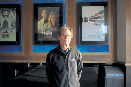  ?? Da'Shaunae Marisa, © The New York Times Co. ?? Cleveland Cinemas owner Jon Forman, pictured at his Cedar Lee theater in Cleveland Heights, reopened two of his four theaters but is considerin­g shuttering them again until demand picks back up.