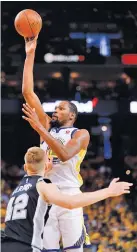  ??  ?? NHAT V. MEYER/BAY AREA NEWS GROUP Warriors' Kevin Durant takes a shot against Spurs in Game 1 of their NBA first-round playoff series at Oakland’s Oracle Arena on April 14, 2018.