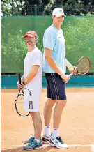  ??  ?? Little and large: Simon Briggs (left) measures up to big-serving John Isner