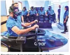  ?? PHOTO:PTI ?? Employees demonstrat­e at the virtual reality section during the inaugurati­on of world’s largest mobile experience centre ‘Samsung Opera House’ in Bengaluru on Tuesday