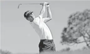  ?? JASEN VINLOVE/USA TODAY SPORTS ?? Justin Thomas tees off on the fourth hold during the final round of the Honda Classic at PGA National.