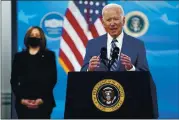  ?? EVAN VUCCI — THE ASSOCIATED PRESS ?? President Joe Biden speaks during an event on COVID-19 vaccinatio­ns, in the South Court Auditorium on the White House campus, Monday in Washington, as Vice President Kamala Harris listens.