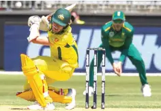  ??  ?? Australia’s Pat Cummins ducks a bouncer during the first one-day internatio­nal (ODI) cricket match between South Africa and Australia at the Optus Stadium in Perth. — AFP photo