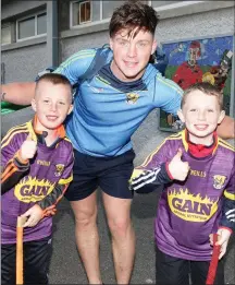  ??  ?? Gerrup outta that...Conor McDonald with Barry Kennedy and Jake Fortune from Enniscorth­y after Saturday’s epic game.