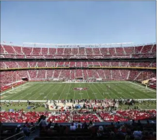  ?? TONY AVELAR — THE ASSOCIATED PRESS ?? Fans watch an NFL game between the 49ers and Cardinals at Levi’s Stadium in Santa Clara, Calif., site of Monday’s title game.