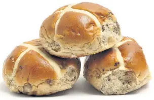  ??  ?? > Halved hot cross buns can then be put in the toaster straight from your freezer