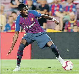  ?? ALBERT GEA / REUTERS ?? En acción El delantero francés del Barcelona Ousmane Dembélé ha mejorado su crédito en este inicio de temporada con sus goles en la Supercopa de España ante el Sevilla y en la Liga contra el Valladolid