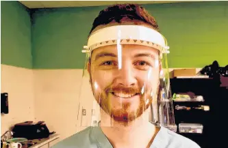  ?? SUBMITTED ?? As the chief operating officer of Polyunity, which manufactur­es PPE face shields in St. John’s for Eastern Health, Dr. Travis Pickett has been able to use his company’s product.