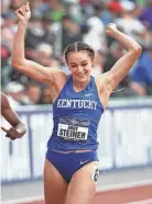  ?? CHRIS PIETSCH/THE REGISTER-GUARD ?? Abby Steiner of Kentucky celebrates after winning the women’s 200m in a collegiate record 21.80 on Saturday.