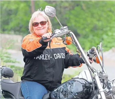  ?? Picture: Gareth Jennings. ?? Nicky Milne rode on the back of a Harley Davidson as part of her A-Z tick list.