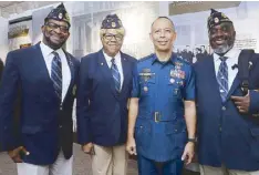  ??  ?? Philippine Air Force Chief of Air Staff Maj. Gen. Glicerio Peralta (third from left) with members of the American Legion.
