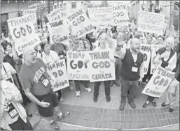  ?? Calgary Herald Archive ?? Gays attending the Metropolit­an Community Churches’ World Jubilee in Calgary celebrate same-sex marriage becoming law in Canada in July 2005. Reader says religious leaders don’t automatica­lly denounce gays.