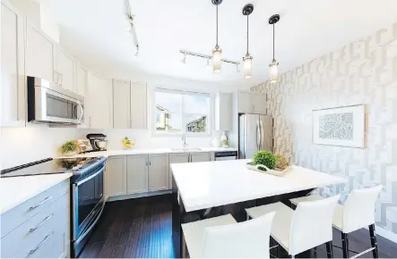  ?? PHOTOS: BROOKFIELD RESIDENTIA­L ?? The Plum show home at the Link at Evanston features a well-designed kitchen with generous counter space.