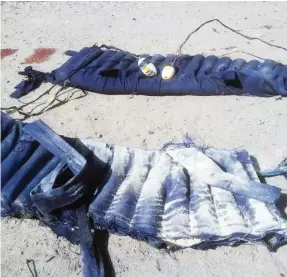  ?? Photo: Army Headquarte­rs ?? One of the female suicide bombers apprehende­d by troops of Operation Lafiya Dole deployed around Gamboru Ngala, Borno State in the early hours of Tuesday. On the right is the suicide bomb vest recovered from them.