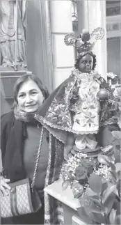  ?? ?? (From left) Debbie Dixie Duraliza, former The Freeman opinion and entertainm­ent editor, pose with her mother at the Cathedral of the Our Lady of the Angels in Los Angeles, California, while former The Freeman news writer Flor Perolina-Lungayan posts a solemn tribute to Sto. Niño at the St. Patrick's Church on Long Island.