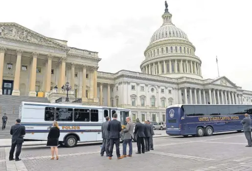  ?? SUSANWALSH, AP ?? House Republican­s prepare to leave Capitol Hill for the White House on Thursday after passing the Republican health care bill to replace Obamacare. The measure now goes to the Senate.