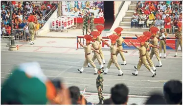  ??  ?? An experience not to be missed is the lowering of the flags ceremony at the Wagah border.