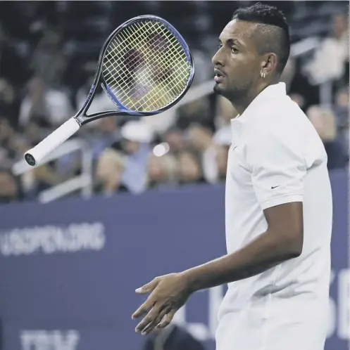  ?? PICTURE: CHARLES KRUPA/AP ?? 0 Nick Kyrgios flips his racket while preparing to receive serve in his match against Steve Johnson.
