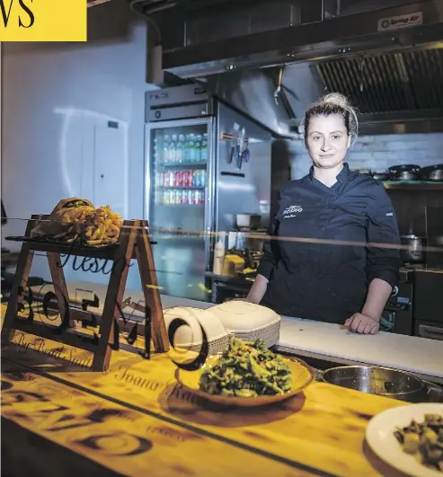  ?? TIJANA MARTIN/THE CANADIAN PRESS ?? Toronto chef Ivana Raca has broken several barriers in the restaurant industry. Raca says that as she worked her way up through the ranks, her actions were more closely scrutinize­d than those of her male co-workers.