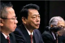  ??  ?? Washizawa (centre) speaking at a press conference after the group's AGM. With him are Poh (left) and Aeon chairman Datuk Abdullah Mohd Yusof.