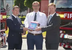  ??  ?? Paul L’Estrange, Chief Fire Officer, Wexford, Minister John Paul Phelan, and Dr Derek Sinnott, Head of WIT’s Department of the Built Environmen­t.