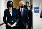  ?? AP ?? CDC Director Dr. Rochelle Walensky leads President Joe Biden into the room for a COVID-19 briefing in Atlanta.