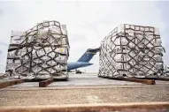  ?? MICHAEL CONROY/ASSOCIATED PRESS ?? Pallets of baby formula wait to be put on a truck after arriving on an Air Force C-17 at the Indianapol­is Internatio­nal Airport.