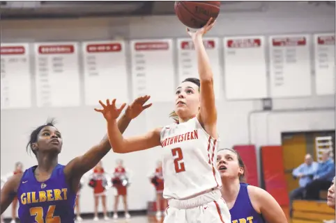  ?? Pete Paguaga / Hearst Connecticu­t Media ?? Northweste­rn’s Frankie DeSanti lays the ball in against Gilbert in the Berkshire League semifinals on Tuesday night.