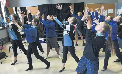  ??  ?? AND ALL THAT JAZZ: Ararat Marian College students rehearse for their upcoming production ‘Chicago’ at Ararat Town Hall from August 15 to 17. Imogene Tonks, front, is playing lead character Velma Kelly.
Picture: PAUL CARRACHER