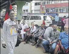  ?? AFP ?? DMK supporters gather in front of the hospital where their party president M Karunanidh­i is admitted in Chennai on Saturday.