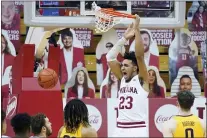  ?? DARRON CUMMINGS — THE ASSOCIATED PRESS FILE ?? Indiana’s Trayce Jackson-Davis (23) dunks during the first half of an NCAA college basketball game against Minnesota in Bloomingto­n, Ind., in this Wednesday, Feb. 17, 2021, file photo.