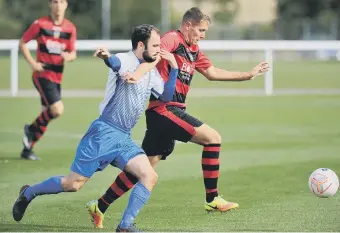  ??  ?? Harton & Westoe CW (white) battle in vain against Hebburn Town Reserves in last weekends’ derby.