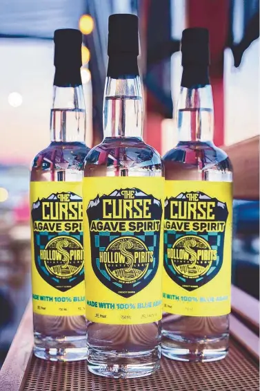  ?? COURTESY OF HOLLOW SPIRITS ?? This bottle of agave from Hollow Spirits is a collaborat­ion with The Curse, a support group for the New Mexico United soccer team, and will raise money for charity.