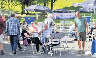  ??  ?? Thirsty work The car park at the Cherrybank has been converted into a beer garden