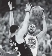  ?? FRANK GUNN AP ?? Warriors guard Stephen Curry shoots over Raptors guard Fred VanVleet during Game 3 of the NBA Finals.