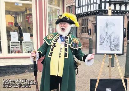  ??  ?? Leek town crier Bill Lomas giving out a ‘cry’ to celebrate his five years of service.