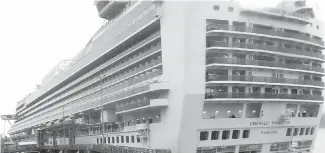  ??  ?? The Emerald Princess cruise ship docks in Juneau, Alaska, on Wednesday.