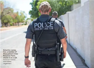  ?? PHOTOS BY THOMAS HAWTHORNE/ THE REPUBLIC ?? Detective Jamey Cox, a member of Mesa police’s Crisis Response Team, checks in on a call.