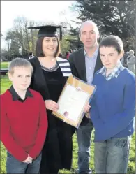  ??  ?? Melanie Carroll from White Rock with her husband Kieran and sons Garry and Adam.