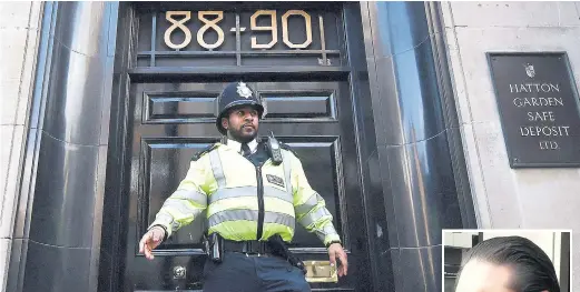  ??  ?? Police guard the entrance to the vaults and, right, jeweller Michael Miller waiting for news yesterday