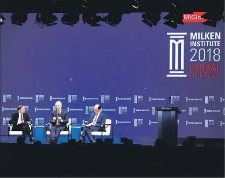  ?? Jae C. Hong Associated Press ?? AT LAST YEAR’S Milken Institute Global Conference, former British Prime Minister Tony Blair, center, speaks, as moderator Michael Milken, right, and retired Gen. David Petraeus listen. The four-day 2019 conference at the Beverly Hilton begins this weekend.