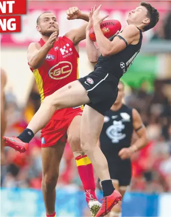  ?? Picture: GETTY ?? STRENGTH: Carlton’s Sam Walsh takes a mark over Gold Coast’s Jarrod Witts on Sunday.