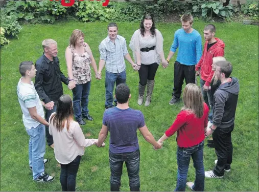  ?? PNG photos ?? Friends and family of Cheryl McCormack and Tyler Miller gather at Miller’s home in Abbotsford, B.C., on July 23. The pair died after taking ecstasy in 2011.