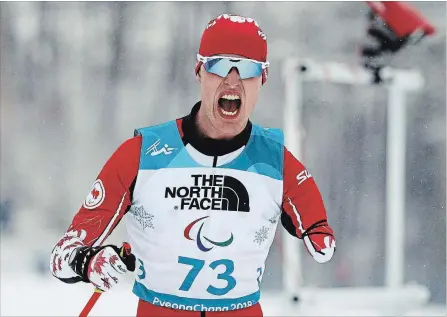  ?? SIMON BRUTY THE ASSOCIATED PRESS ?? Mark Arendz celebrates his victory in the biathlon standing men's 15K Friday. Four years ago he just missed the top of the podium by 0.7 seconds.