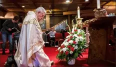  ?? Michael M. Santiago/Post-Gazette ?? Bishop David Zubik kneels in prayer before the altar during a Mass for the 27th annual World Day of the Sick on Feb. 8 at UPMC Mercy in Uptown.