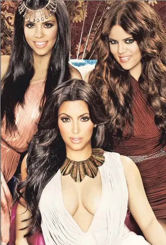  ??  ?? AVERT THY GAZE! (From left) Kourtney, Kim &amp; Khloe Kardashian have elevated exploitati­on into a lucrative business model, so it’s probably best if you stay out of their path.