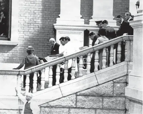  ?? Picture: Tiso Blackstar Group Archive ?? Hendrik Verwoerd is carried from parliament in Cape Town after being stabbed. He was declared dead upon arrival at Groote Schuur Hospital.