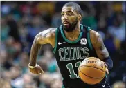  ?? MICHAEL DWYER / AP ?? According to multiple sources, Kyrie Irving threatened to sit out the season and have surgery on his knee if the Cavaliers didn’t honor his trade request.