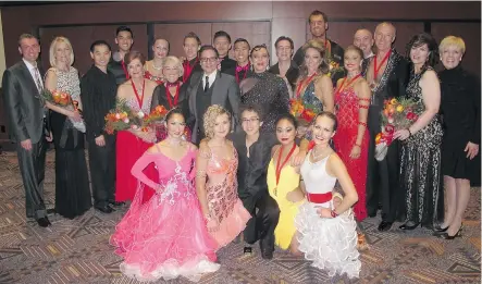  ?? Photos: Bill Brooks/for the Calgary Herald ?? Dancing With Calgary Stars competitor­s and their partners pose with event organizers and Calgary Dance Foundation students.